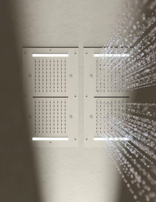 Plafond de douche ciel pluie, cascade, brumisateurs et chromothérapie.